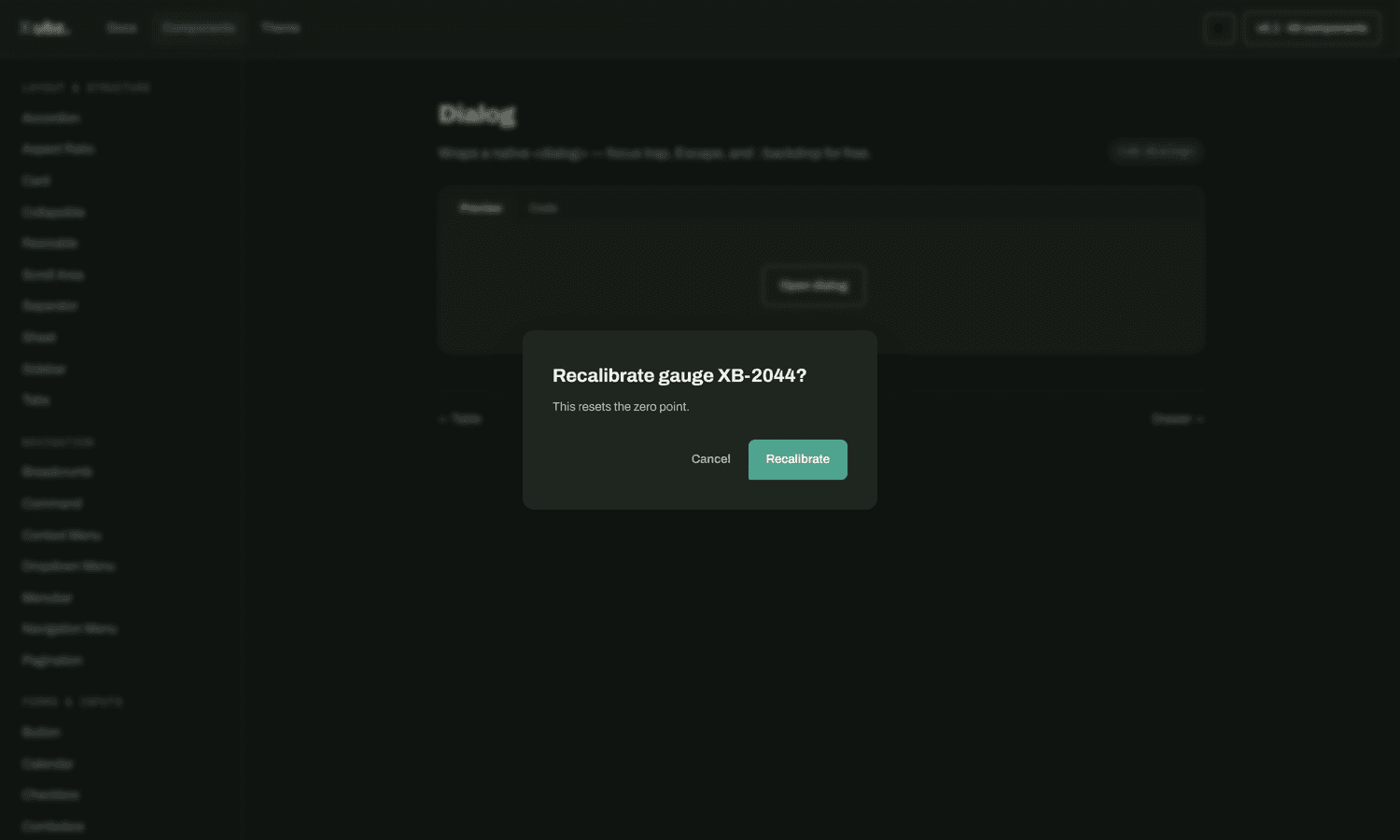 A Xubz UI dialog open over a blurred backdrop, confirming a gauge recalibration, showing the system's verdigris accent and signature asymmetric button corner.